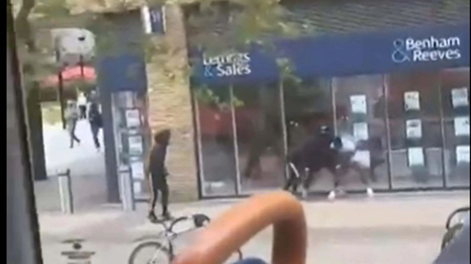 Shocking moment man in his 20s is stabbed with ‘large machete’ in horrific daylight fight as petrified witnesses flee