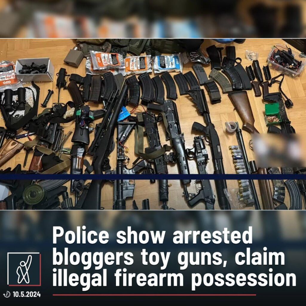 Police shows arrested bloggers (Ucha Abashidze) toy guns, claims illegal firearms possession