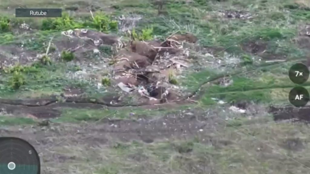 Russian soldier narrowly escapes death by FPV by throwing his duffle bag at it.