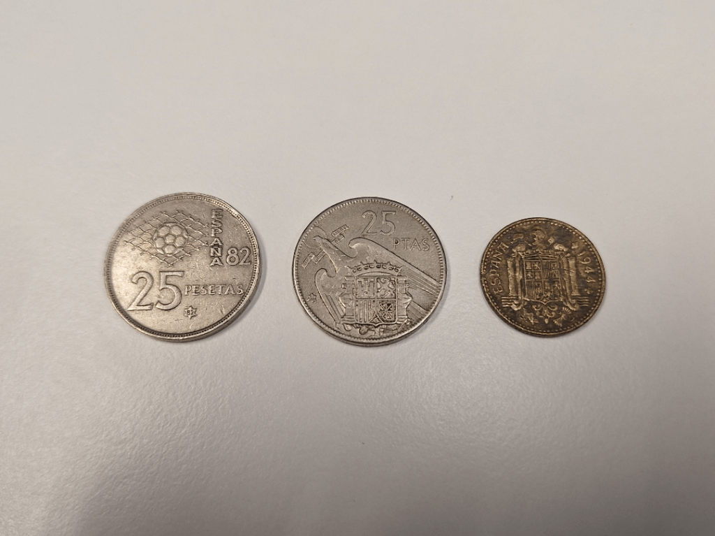 In a store in London I found a coin from the 1982 World Cup, a two Franco coin, from '57 and '44.