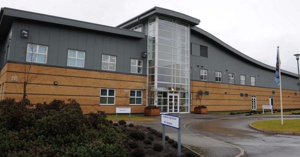 Parents pull children out of 'borstal' school where pupils punished for hugging friends