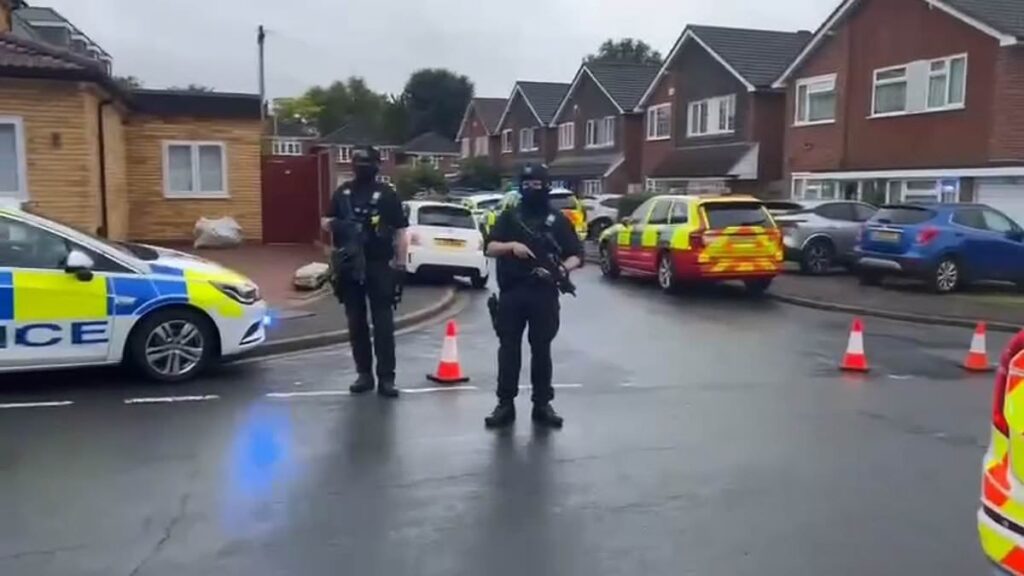BBC Five Live racing commentator John Hunt's wife and two daughters who were 'tied up and shot dead with crossbow by an ex-boyfriend' in their home as manhunt continues for 'killer'