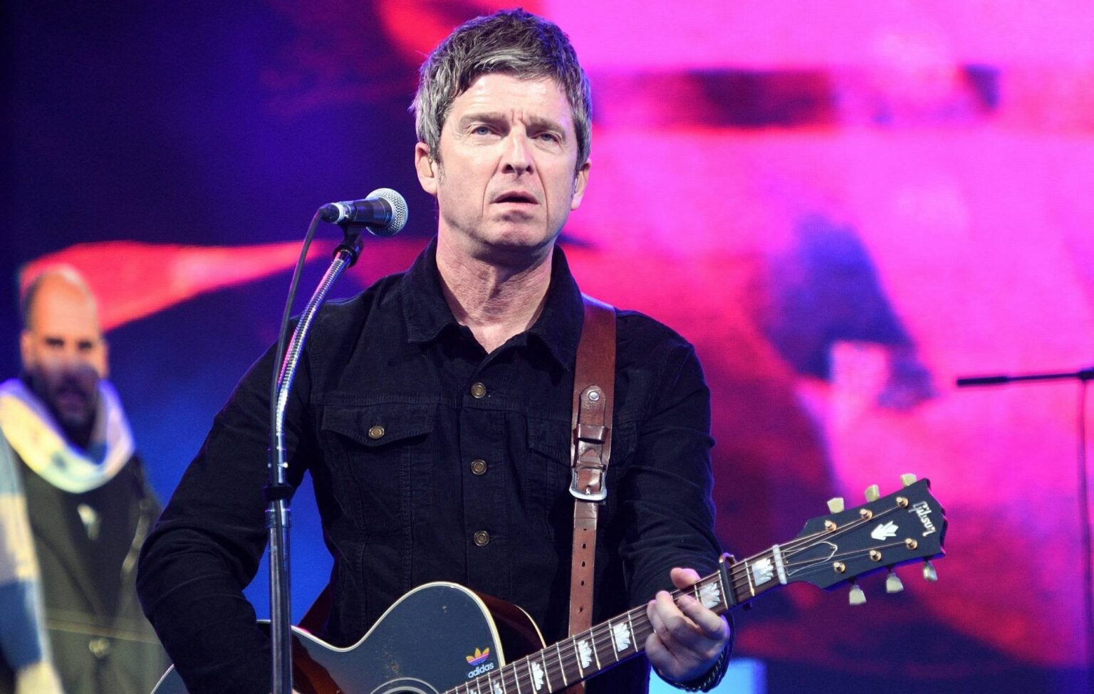 Noel Gallagher says Glastonbury has "gone woke" with "little fucking idiots waving flags around"