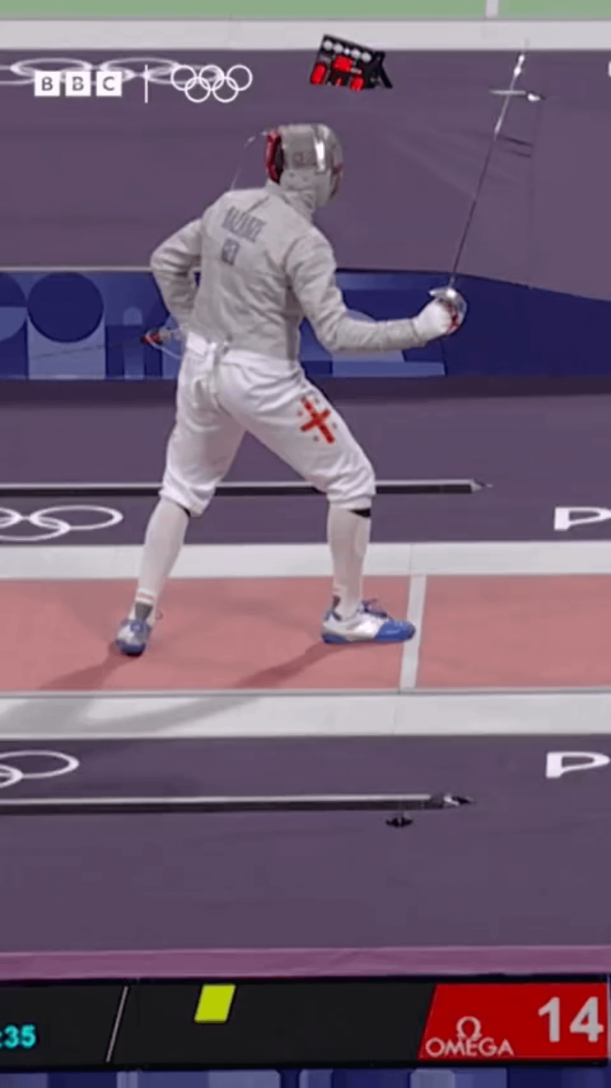 Georgian world number one fencer Sandro Bazadze refused to leave the piste and screamed at referee after losing