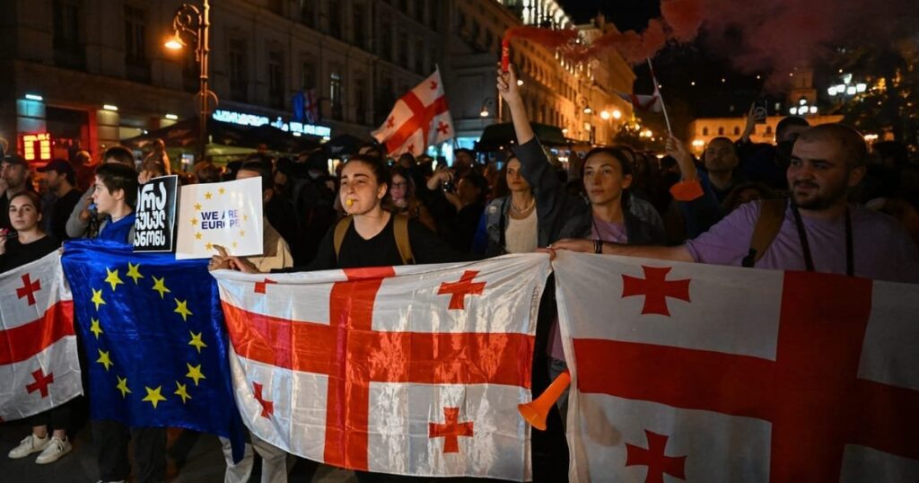 EU warns Georgia not to ban opposition