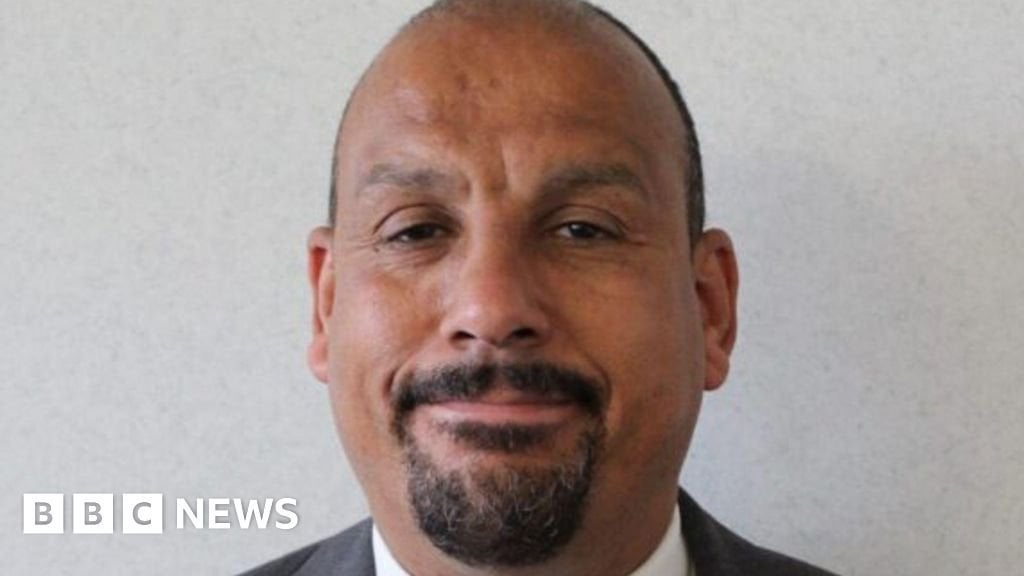BBC News - Councillor charged over 'cut throat' protest remarks