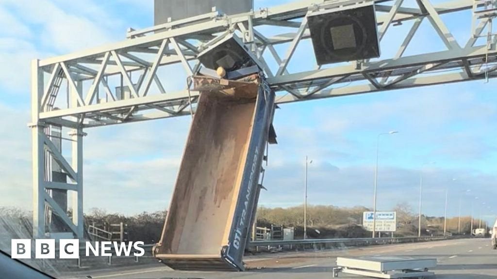 Bristol truck driver who hit M5 gantry banned for one year - BBC News