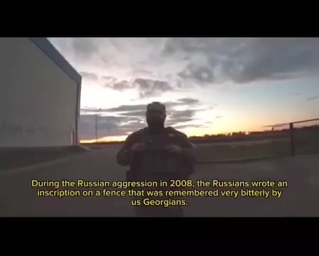 The reason behind the message left on a building wall in Kursk, Russia by Georgian volunteers.