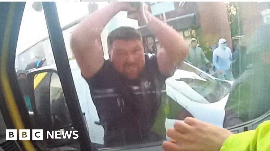 Southport: Body-worn camera captures attack on police van in riots