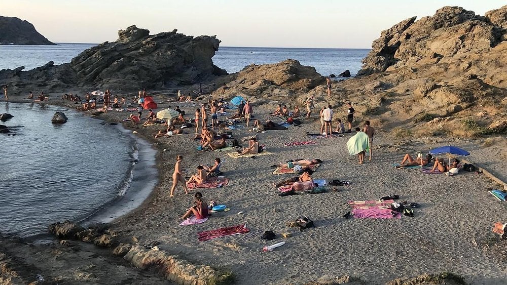 The textile invasion on nudist beaches