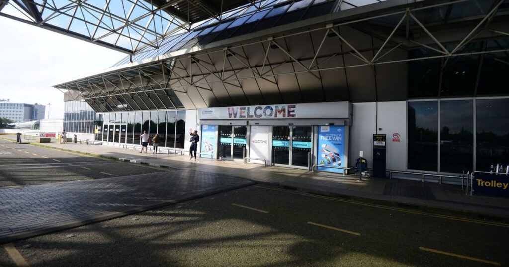 Three police officers hurt after being attacked at Manchester Airport