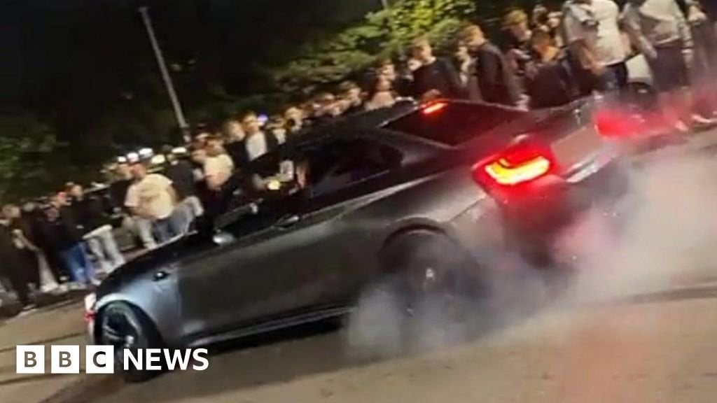 Police confront 'hostile' crowd at fast car meeting