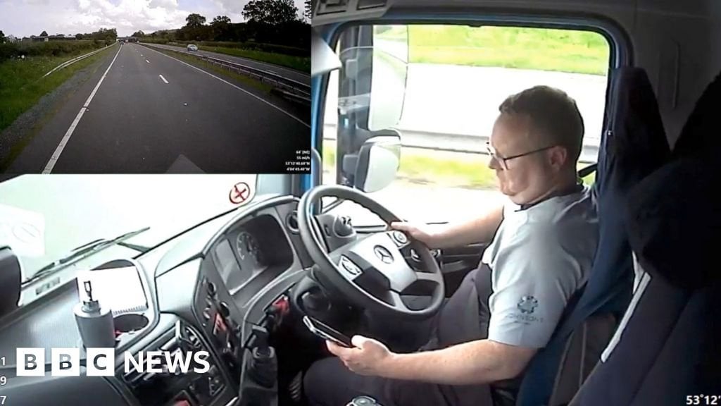 A55: Watch as lorry driver crashes while distracted by phone