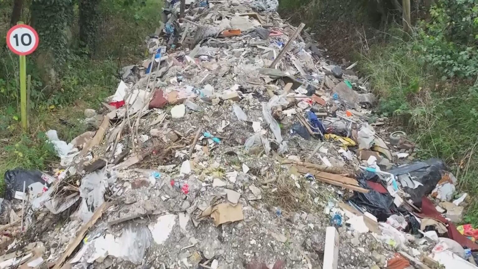 Drone images reveal 50-metre trail of illegally dumped waste on disused road near the M2 in Kent