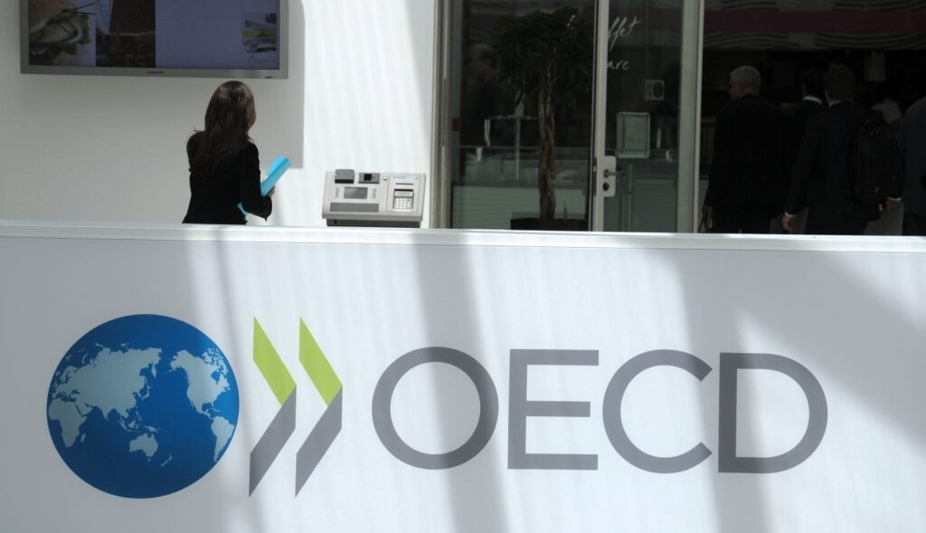 ‘Expensive triple lock’ needs to be reformed to get UK finances in order, OECD says