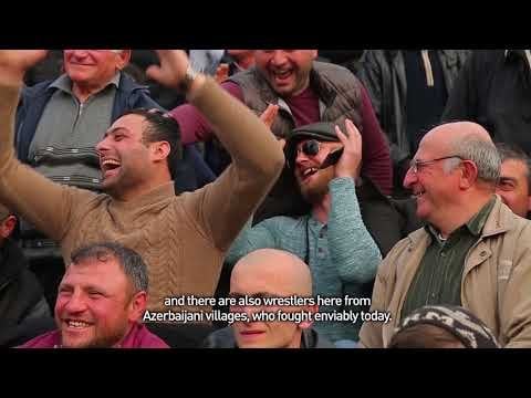 Can someone please tell me the name of the song in the background at 0:33?