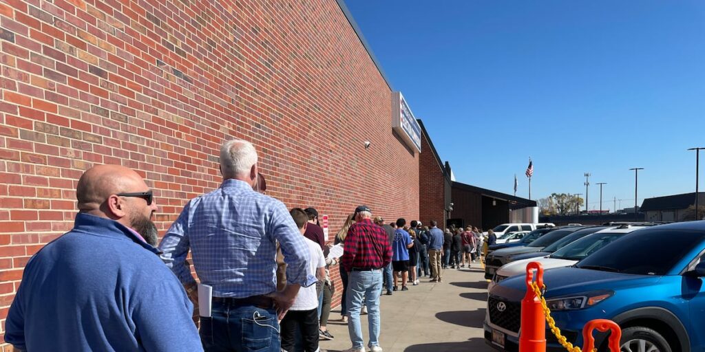Douglas County voters excited to see long lines as they cast ballots early Douglas County voters excited to see long lines as they cast ballots early