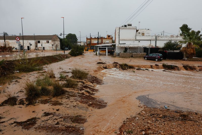 Heavy rains cause flash floods in Spain’s south, east Valencia region in the highest red alert for extreme rainfalls