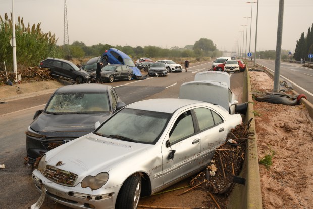 VALENCIA, SPAIN - OCTOBER 30: Cars piled up after flash flooding hit the region overnight on October 30, 2024 in Valencia, Spain. Spanish authorities said on Wednesday that at least 51 people had died in the Valencia region overnight after flash-flooding followed heavy rain. Spain's meteorological agency had issued its highest alert for the region due to extreme rainfall. (Photo by David Ramos/Getty Images)