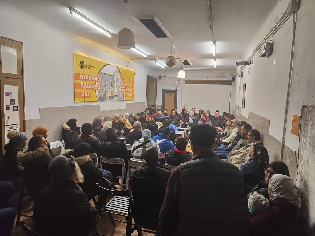 Members of PAHC hold an assembly inside Ateneu La Sèquia in Manresa, Catalonia, in winter 2024.