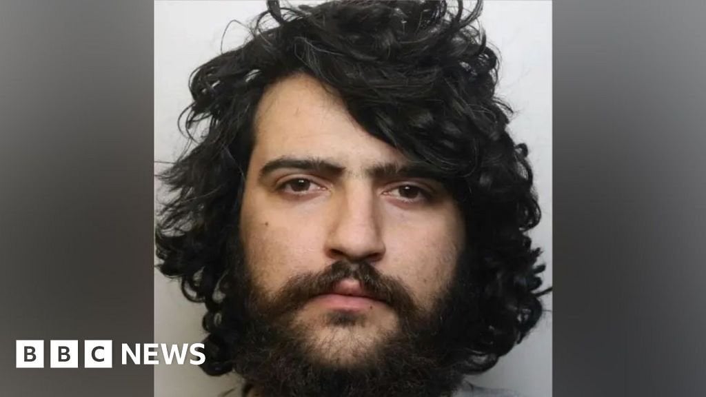 Man jailed for pushing postman onto Tube tracks