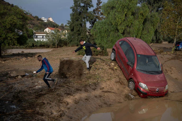 Four missing as torrential rains slam Spain Emergency services rescued scores of people in Alora in Andalusia in southern Spain after a river overflowed. (JORGE GUERRERO)