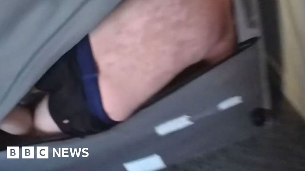 Police find wanted man hiding inside a sofa