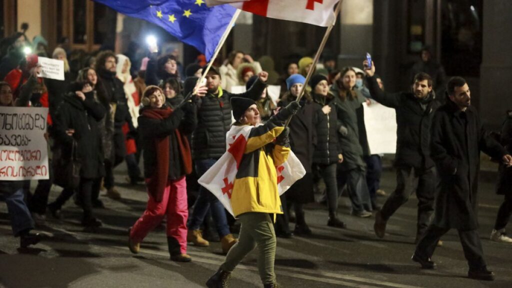 Protests in Georgia continue unabated on eve of presidential election by college