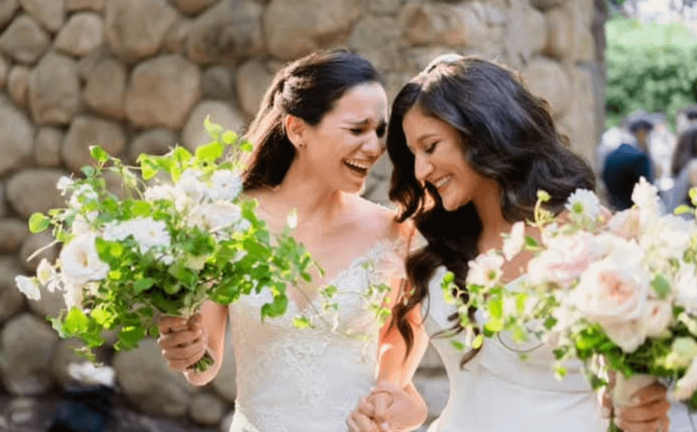 Lexie Rukhadze and her wife, Jill. Lexie is the daughter of Irakli Rukhadze, the owner of IMEDI TV, a pro-government propagandist media outlet that significantly contributes to fostering anti-LGBT sentiments in the country
