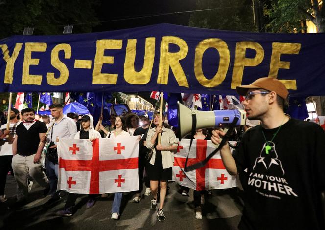 People take part in a protest against a bill on 