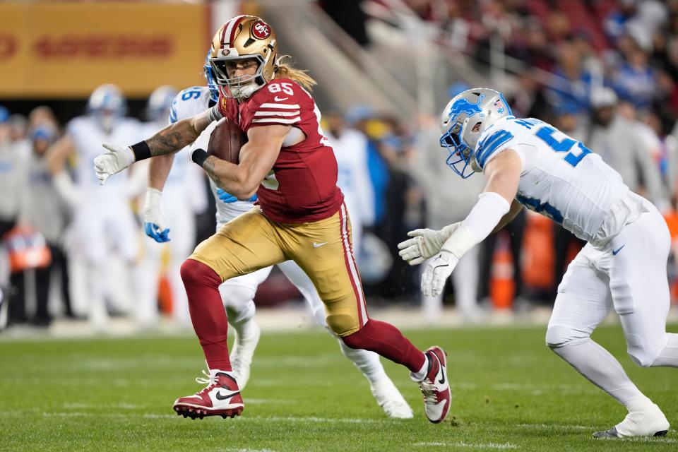 SANTA CLARA, CALIFORNIA - DECEMBER 30: George Kittle #85 of the San Francisco 49ers carries the ball after his reception as Trevor Nowaske #53 of the Detroit Lions pursues during the first quarter at Levi's Stadium on December 30, 2024 in Santa Clara, California. (Photo by Thearon W. Henderson/Getty Images)