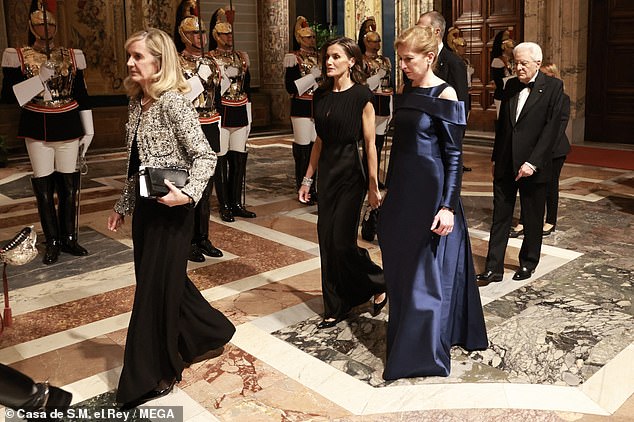 Letizia accessorised her gown with black heels, and kept her hair down for the occassion this evening