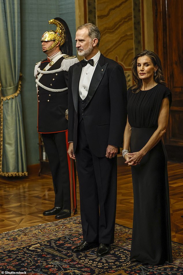 Queen Letizia of Spain was effortlessly glamorous in a sleek black gown as she joined her husband at gala dinner hosted by the Italian president