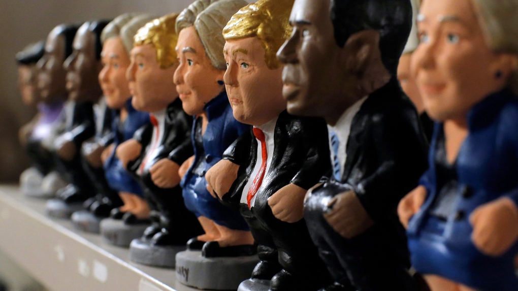 ‘Caganer’ for Trump: The Christmas ‘pooper’ figurines in Spain Clay miniatures of Hillary Clinton, Donald Trump and Barack Obama as a 'caganer,' displayed for sale at a shop in Barcelona, Spain. (AP Photo/Manu Fernandez)