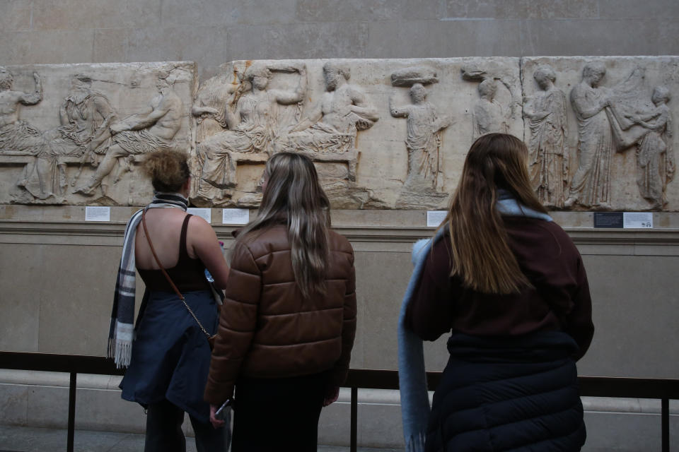 LONDON, UNITED KINGDOM - 2023/11/28: Visitors view Elgin marbles also known as the Parthenon marbles, at the British Museum, London following a diplomatic row between UK and Greece. Greek Prime Minister Kyriakos Mitsotakis was due to meet British Prime Minister Rishi Sunak. However the meeting, which was to cover wide-ranging issues, was cancelled folowing a diplomatic row concerning the Parthenon marbles. The marbles are a collection of Ancient Greek sculptures from the Acropolis in Athens and were removed from the Parthenon in the early 19th century by Thomas Bruce, the 7th Earl of Elgin and then-British ambassador to the Ottoman empire. Greece has long requested that the sculptures be returned to Greece. (Photo by Steve Taylor/SOPA Images/LightRocket via Getty Images)