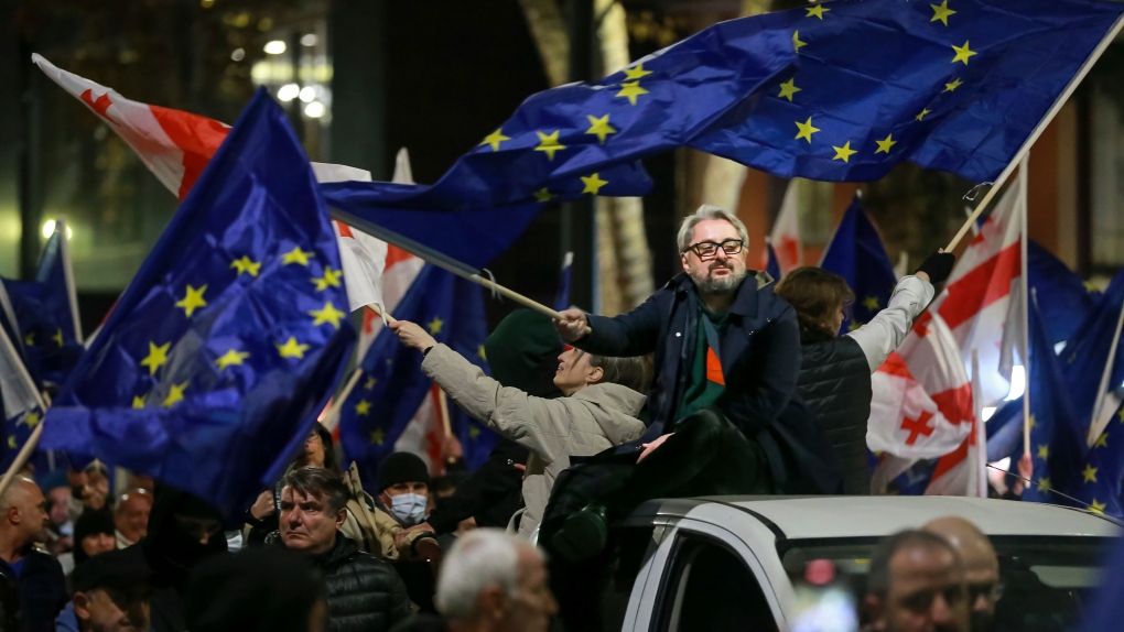 Nika Gvamaria, co-leader of Coalition for Change, joins anti-government protests in Tbilisi, Georgia, November 17. (Zurab Tsertsvadze / AP via CNN Newsource)