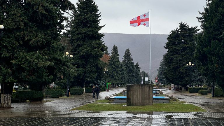 A Georgian flag flying in the town of Gori