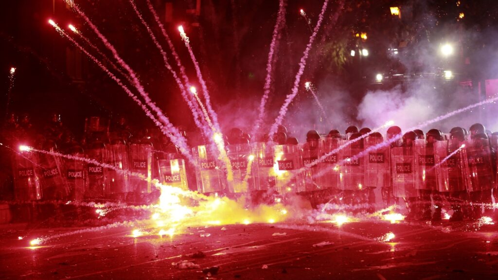Over 40 people hospitalized in Georgia during protests over suspension of EU talks : NPR