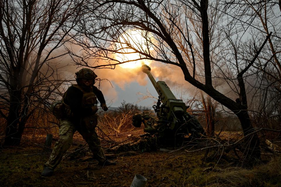 A Ukrainian soldier fires a 122-mm howitzer at Russian positions in the Zaporizhzhia region in January.