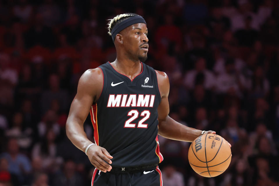 MIAMI, FLORIDA - JANUARY 19: Jimmy Butler #22 of the Miami Heat dribbles the ball against the San Antonio Spurs during the first quarter of the game at Kaseya Center on January 19, 2025 in Miami, Florida. NOTE TO USER: User expressly acknowledges and agrees that, by downloading and or using this photograph, User is consenting to the terms and conditions of the Getty Images License Agreement. (Photo by Megan Briggs/Getty Images)