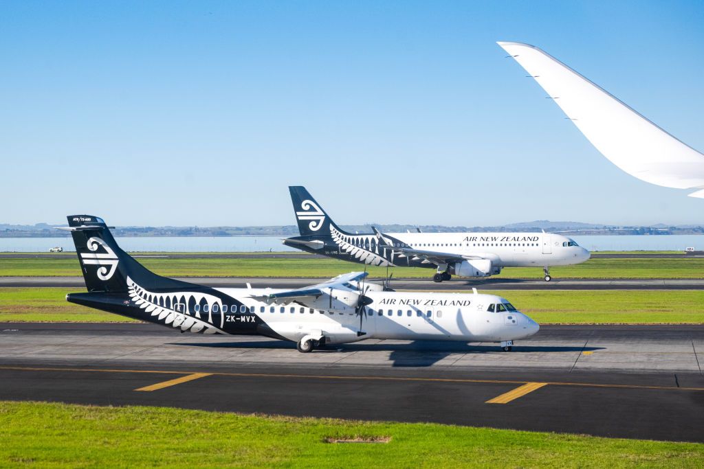 The safest airlines of 2025 Air New Zealand planes stand on the tarmac at the airport in Auckland (Photo by Sina Schuldt/picture alliance via Getty Images)