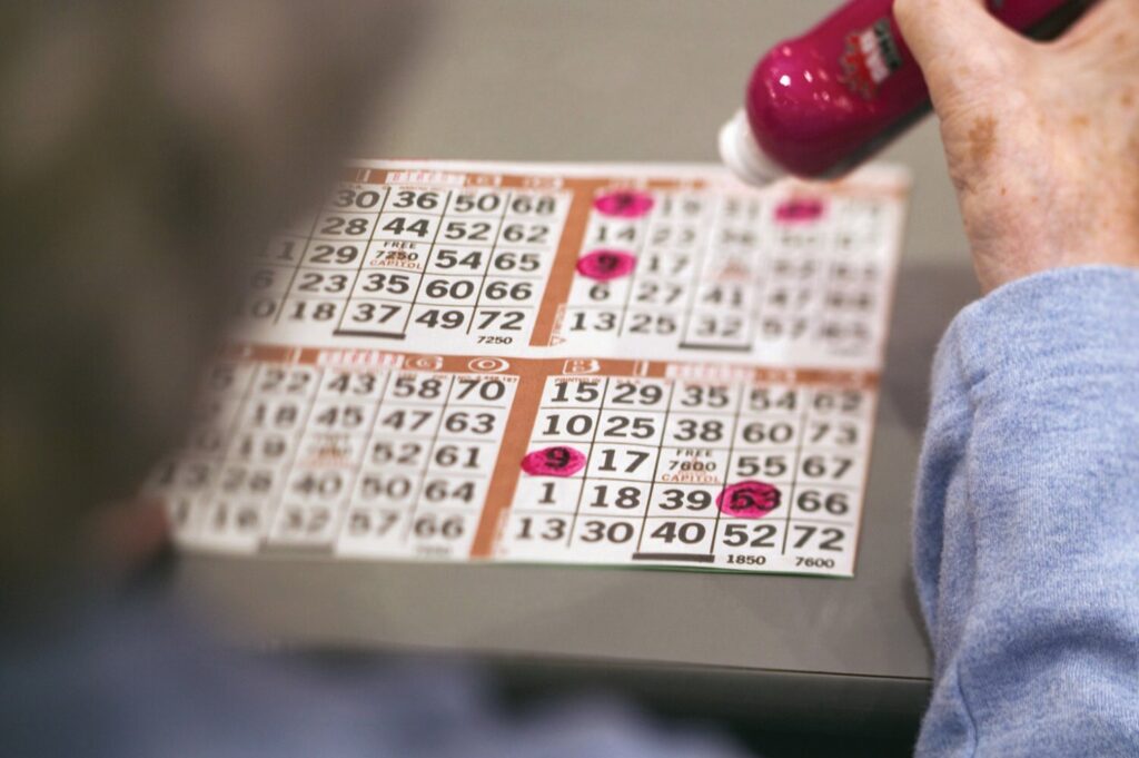 Playing bingo. Stock photo.