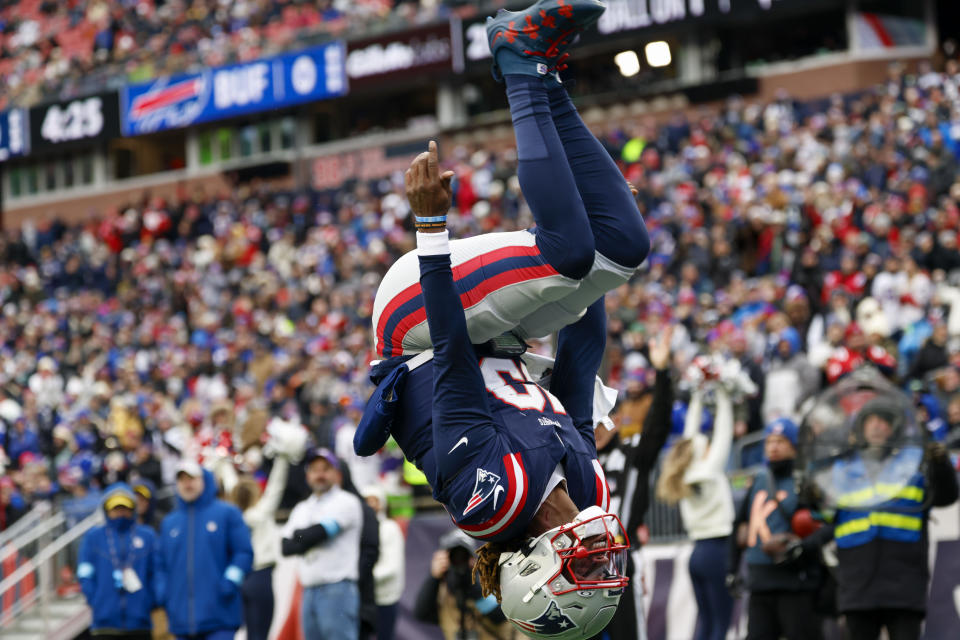 New England Patriots quarterback Joe Milton III (19) does a back flip after scoring a touchdown during the first half of an NFL football game against the Buffalo Bills, Sunday, Jan. 5, 2024, in Foxborough, Mass. (AP Photo/Greg M. Cooper)