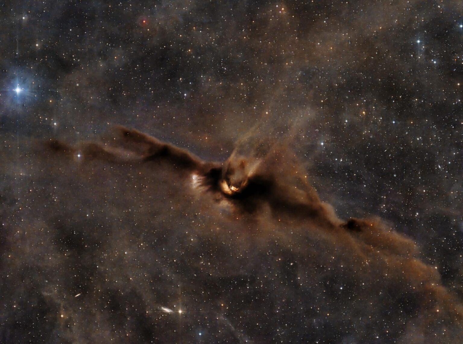 The Cosmic Bat Nebula (LDN 43}