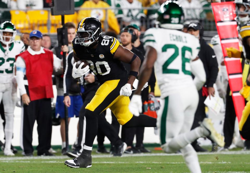 Oct 20, 2024; Pittsburgh, Pennsylvania, USA; Pittsburgh Steelers tight end Darnell Washington (80) runs after a catch against the New York Jets during the second quarter at Acrisure Stadium. Mandatory Credit: Charles LeClaire-Imagn Images