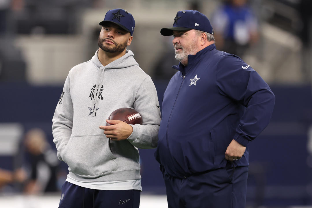 ARLINGTON, TEXAS - JANUARY 05: Dak Prescott #4 and head coach Mike McCarthy of the Dallas Cowboys talk on the field prior to the game against the Washington Commanders at AT&T Stadium on January 05, 2025 in Arlington, Texas. (Photo by Sam Hodde/Getty Images)