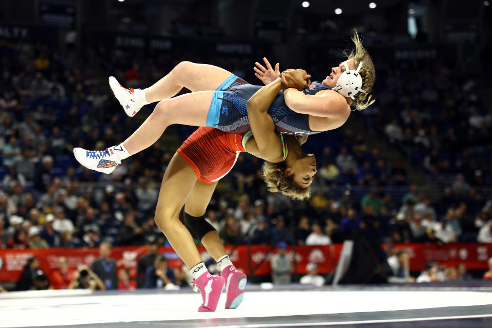 Iowa's Kennedy Blades slams her opponent during U.S. Olympic Trails last April. (Tim Nwachukwu/Getty Images)