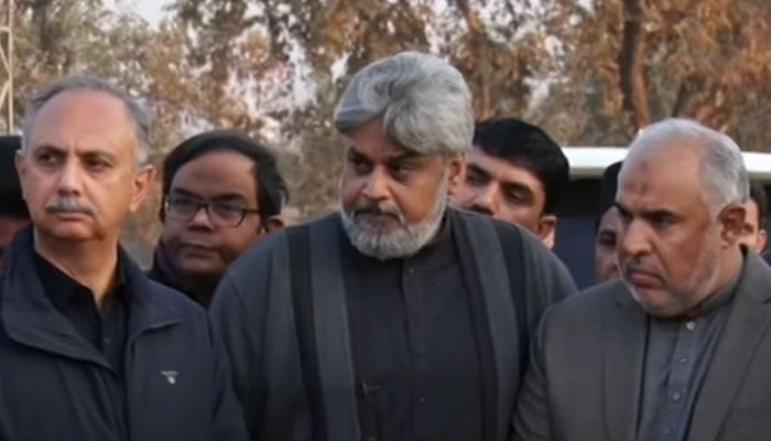 (From left to right) Members of the PTI negotiation Omar Ayub Khan, Sahibzada Hamid Raza and Asad Qaiser address a press conference outside the Adiala Jail in Rawalpindi on January 12, 2024. — YouTube/Geo News/screengrab