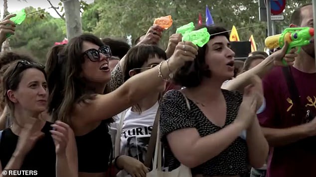 It comes after protestors squirted water guns at tourists eating in popular spots in Barcelona