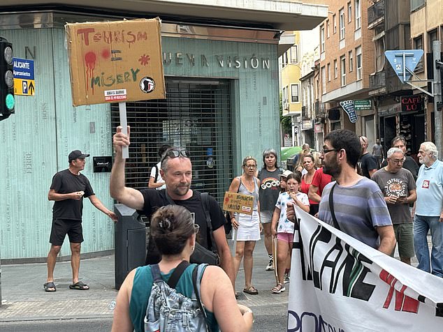 Protestors in Alicante rally against overtourism in the Spanish city, in July 2024